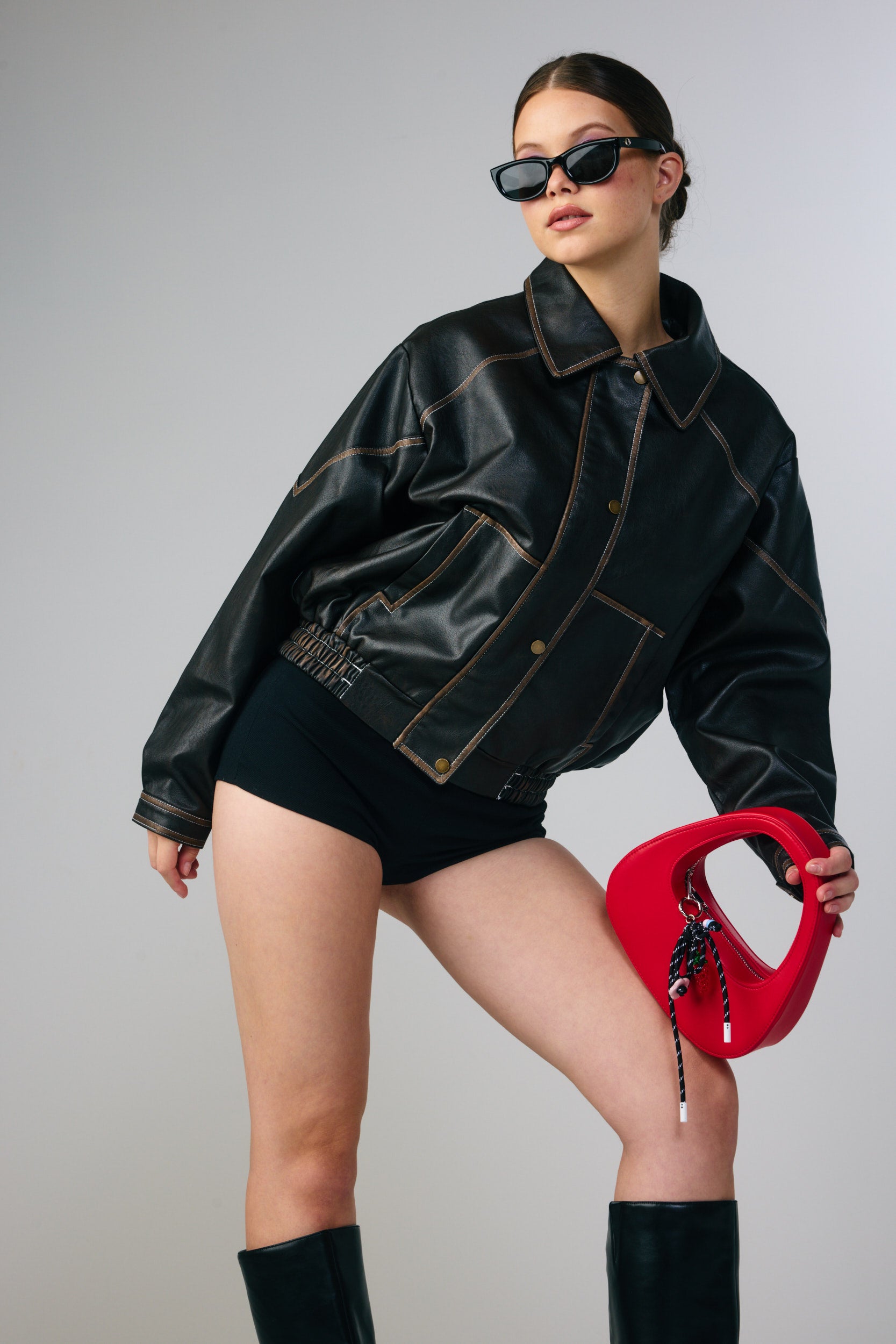 The Halo Bow Charmed Clutch Bag