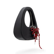 The Halo Bow Charmed Clutch Bag