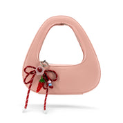 The Halo Bow Charmed Clutch Bag