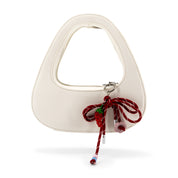 The Halo Bow Charmed Clutch Bag