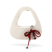 The Halo Bow Charmed Clutch Bag