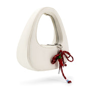 The Halo Bow Charmed Clutch Bag