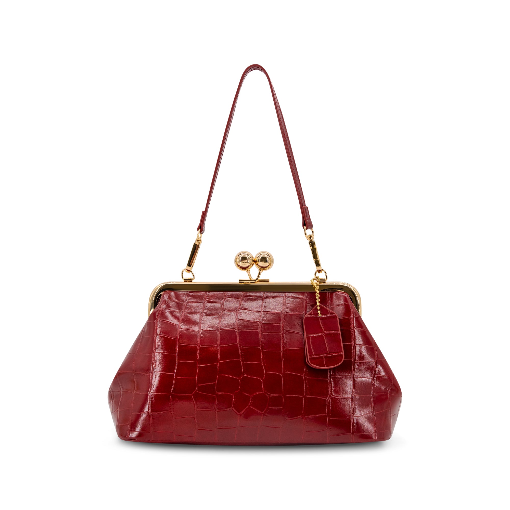 A Wine crocodile-embossed kiss-lock handbag with a gold-tone metal frame and a matching shoulder strap, shown against a plain white background.