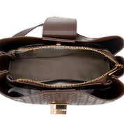 A close-up top-down view of a brown woven leather handbag, showing its interior compartments with gold-tone zippers and a gold clasp, set against a plain white background.