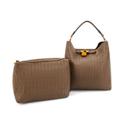 A brown woven leather handbag and matching zip pouch set on a clean white background. The handbag features a structured shape, a top handle, and gold-tone hardware, while the matching pouch has a zippered closure.