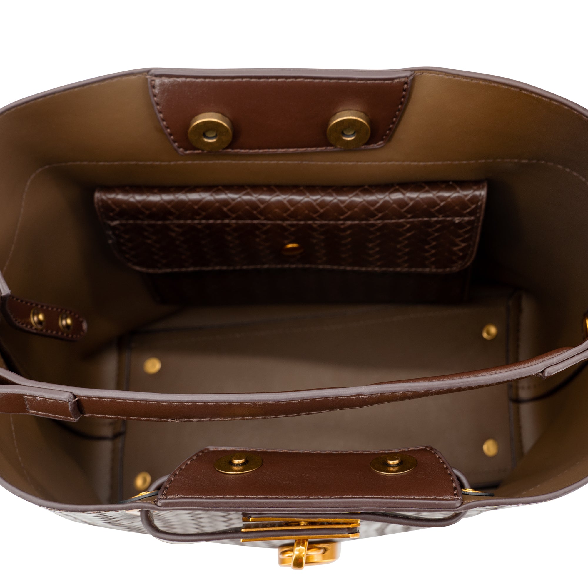 An overhead view of a luxury handbag's interior, featuring a brown leather interior, a dark brown woven-texture card holder, and gold-tone hardware on a white background.