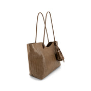 A brown woven leather tote bag with long shoulder straps and a small matching leather pouch, shown on a clean white background.