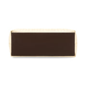 A rectangular clutch bag with a smooth dark brown center panel and a textured cream monogram patterned border, shown from a top-down view on a white background.