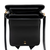 Crossi Bow Embossed Small Crossbody Bag in Black, open interior view